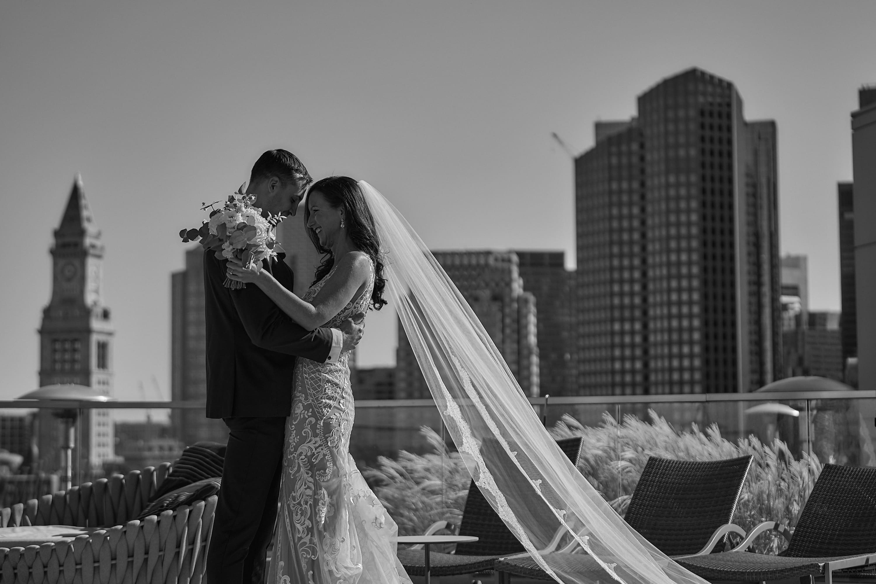 Epic black and white wedding silhouette with the Boston skyline